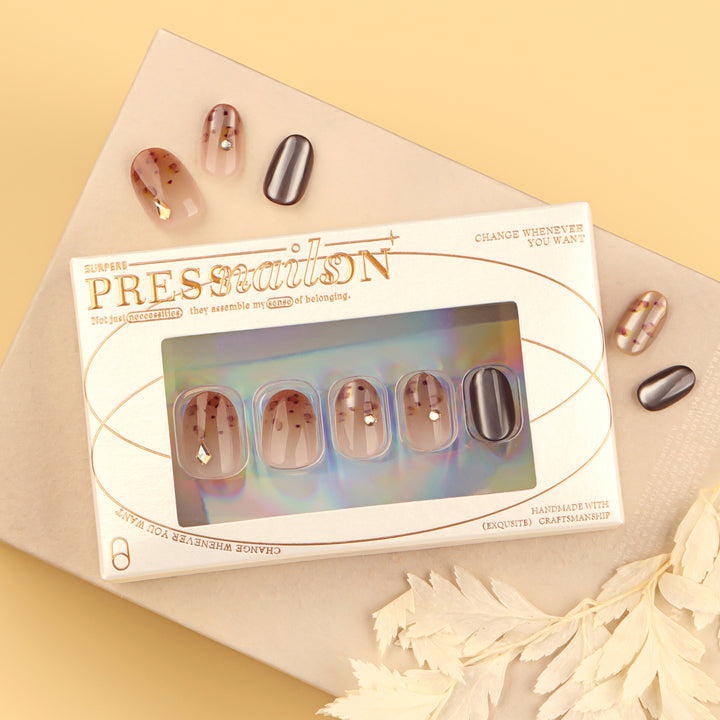 Artistic nail art with glitter accents and elegant design Kalsten
