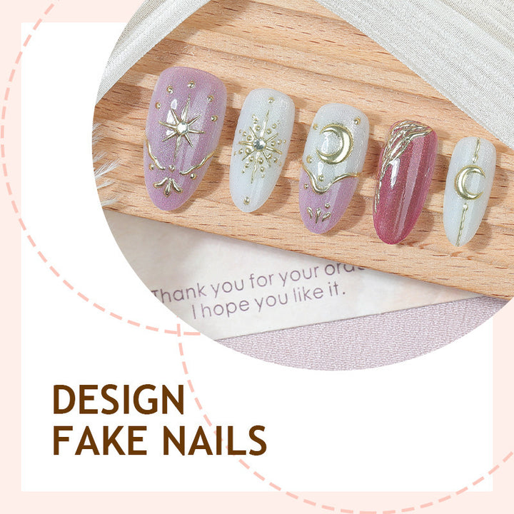 Artificial nail set with delicate gold embellishments and mystical motifs Kalsten