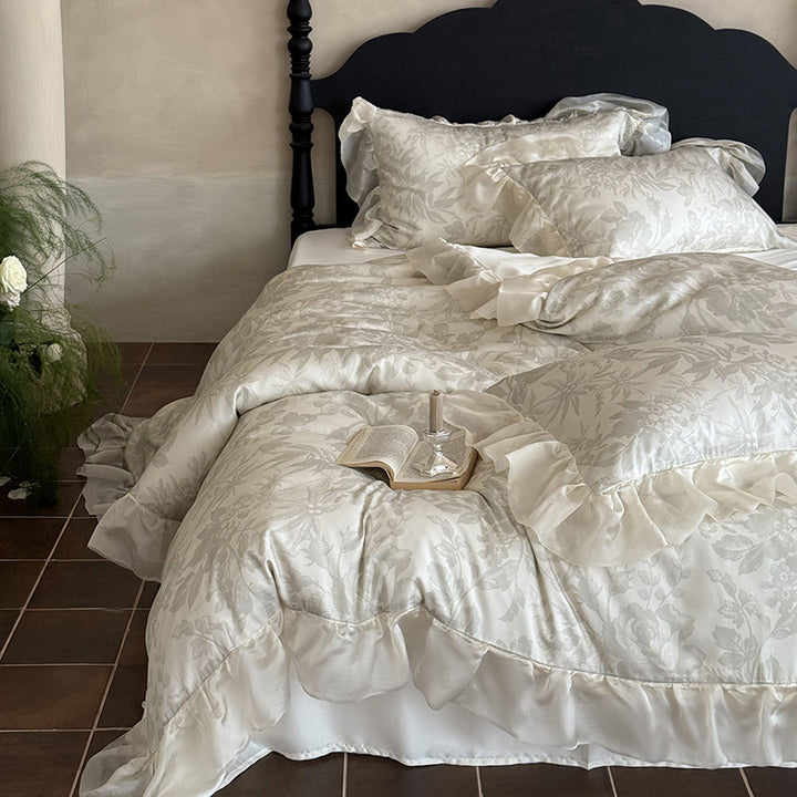 Elegant bedding set made of fine satin jacquard with delicate floral relief and decorative ruffle