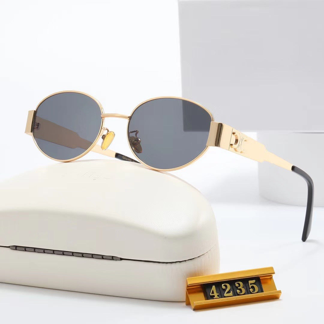 Women elegant oval sunglasses with gold-colored frame Kalsten