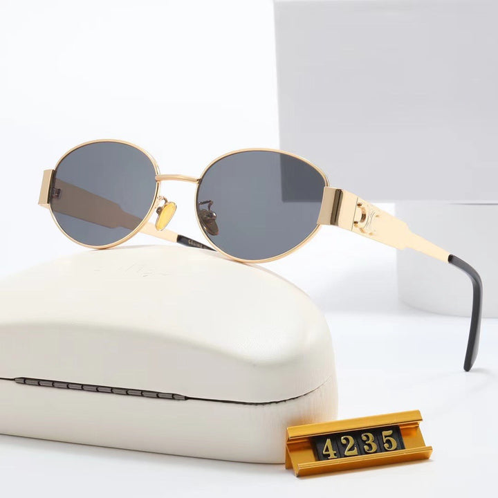 Women elegant oval sunglasses with gold-colored frame Kalsten