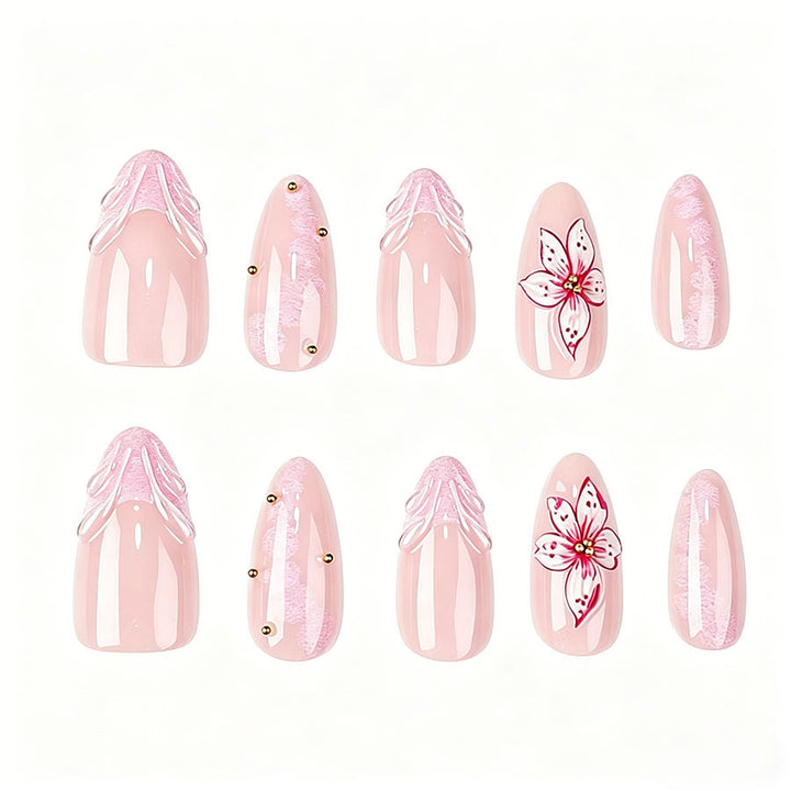 Artificial artificial nails with filigree floral motifs and golden accents Kalsten