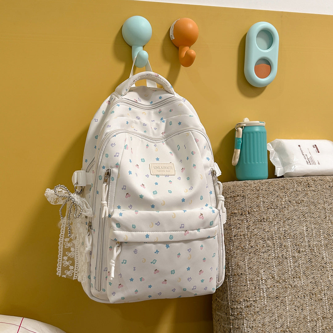 Stylish Multi-Pocket Backpack with Decorative Accents Kalsten