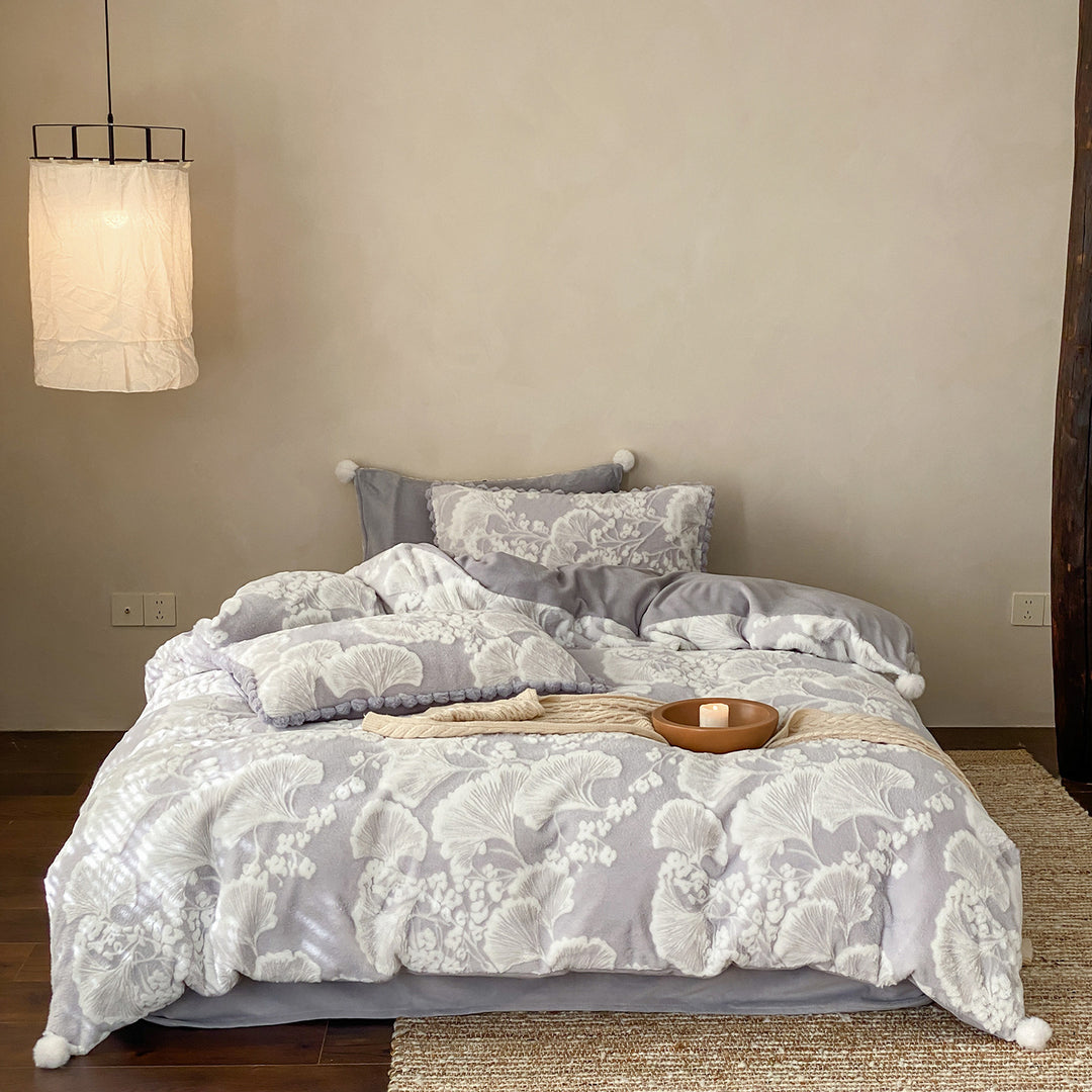 Cozy microfiber bedding set with jacquard floral relief and pompom edge