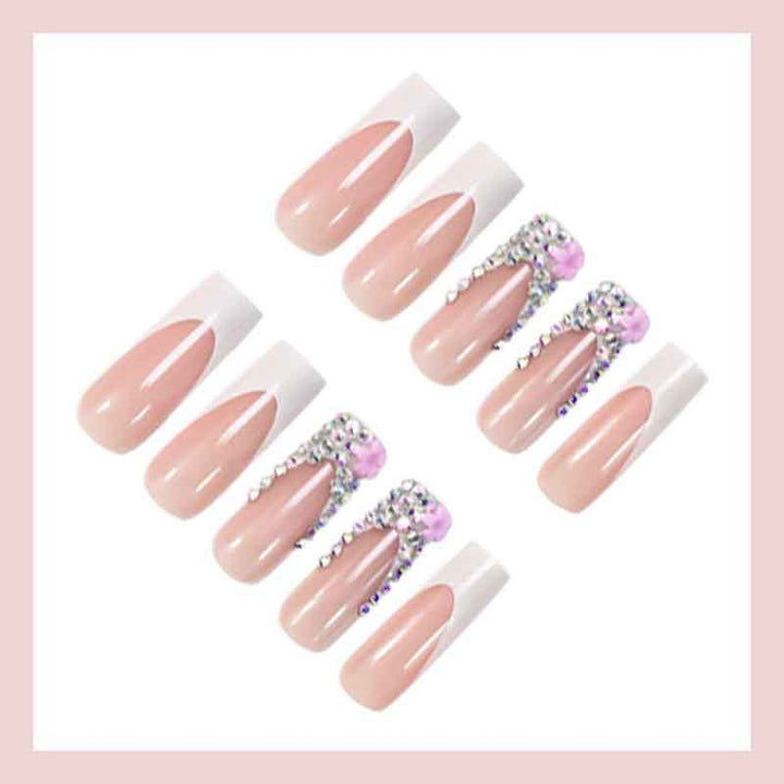 Art nail set with elegant glitter and floral accents Kalsten