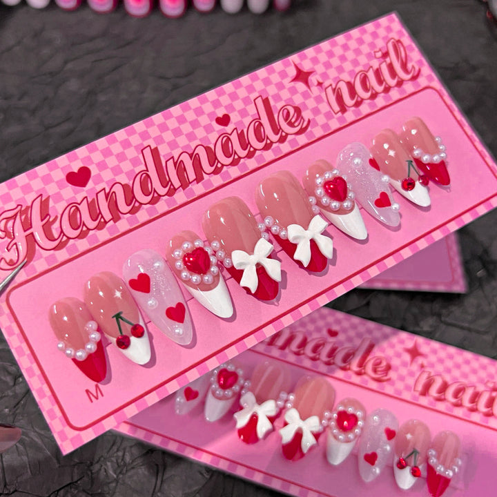 Artful Handmade Nail Art with Hearts and Ribbons Kalsten