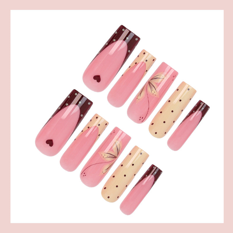 Acrylic nail set with elegant floral and polka dots design Kalsten