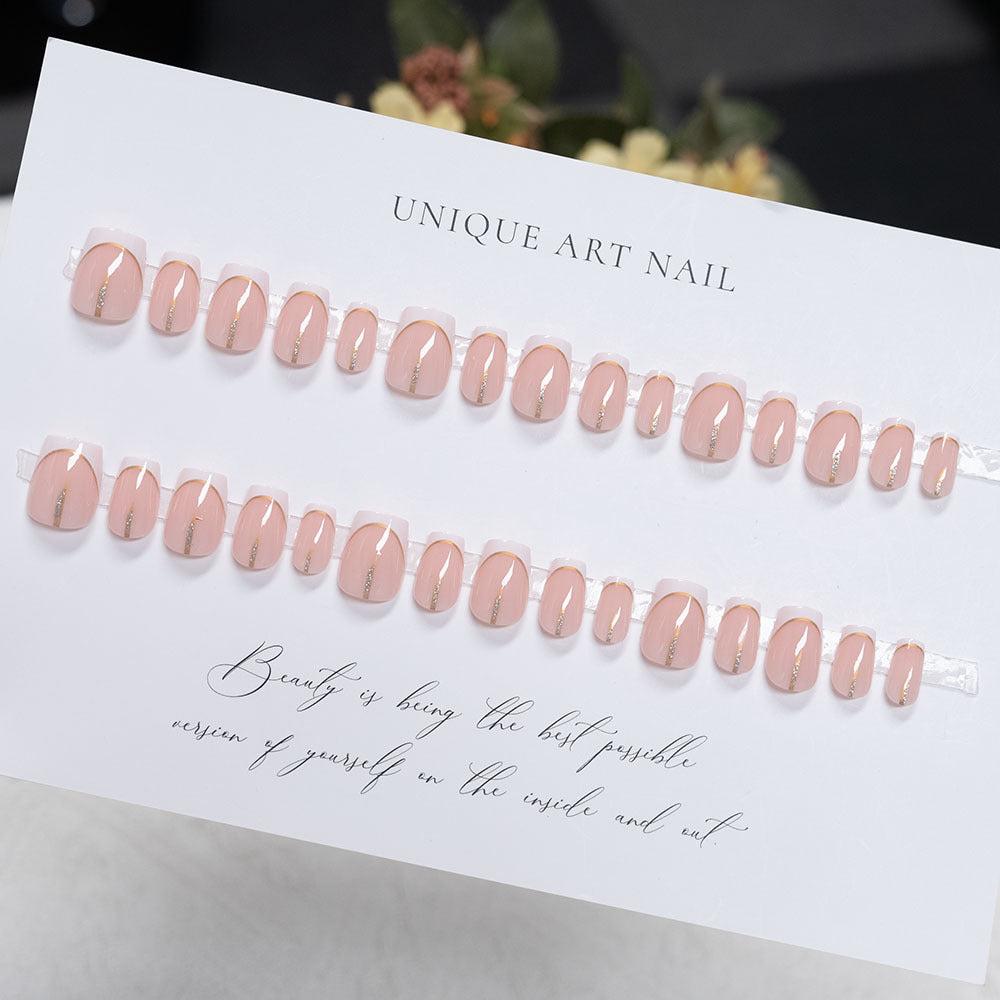 Elegant French Tip Acrylic Press-On Nails with Gold Accent