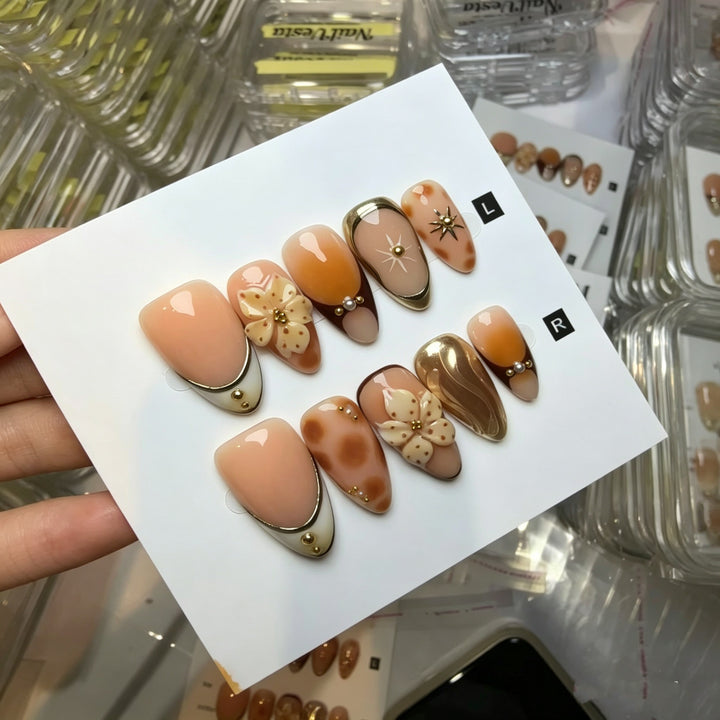 Artistic Press-On Nail Set with Floral and Green Accents
