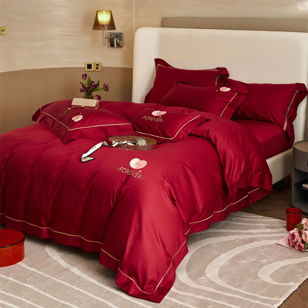 Premium cotton satin bedding set with gold piping and heart embroidery