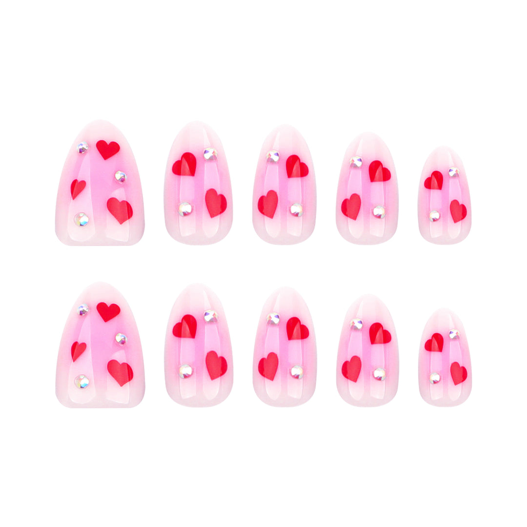 Artful nail art with heart motifs and glamorous details Kalsten