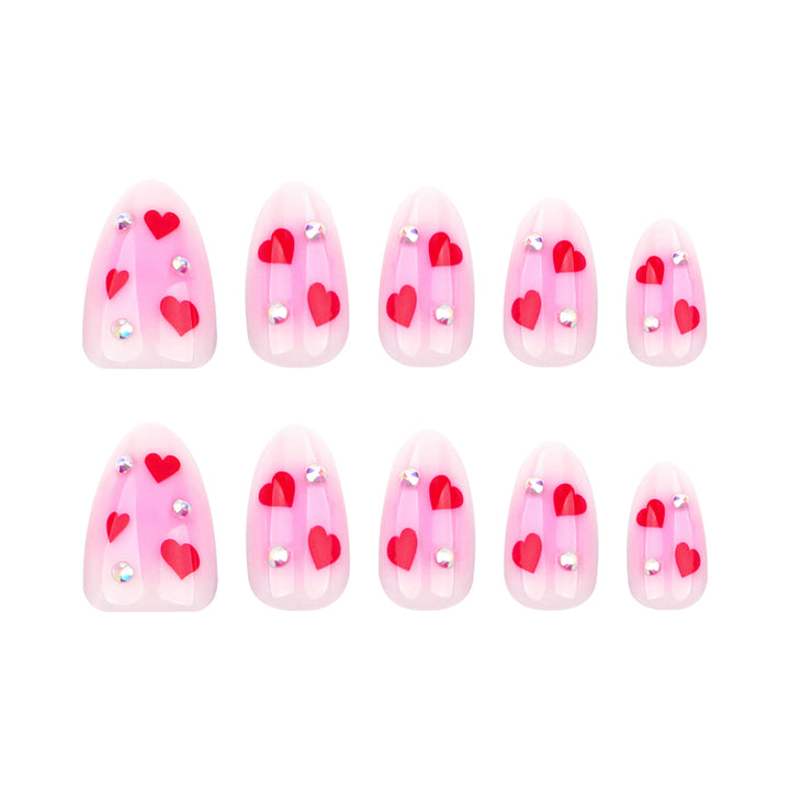Artful nail art with heart motifs and glamorous details Kalsten