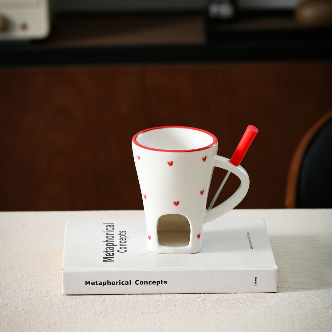 Ceramic mug with integrated tea strainer and silicone drinking straw