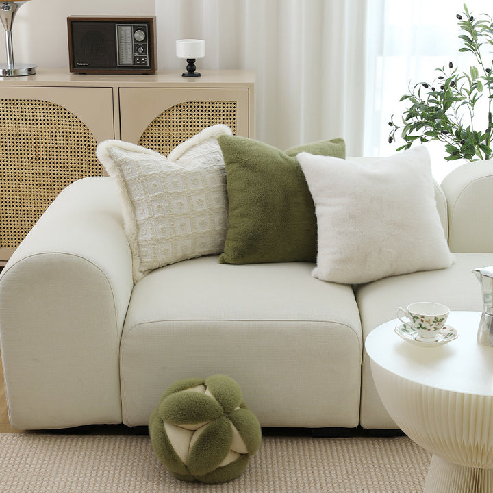 Square plush decorative cushion with microfiber faux fur surface and concealed zipper