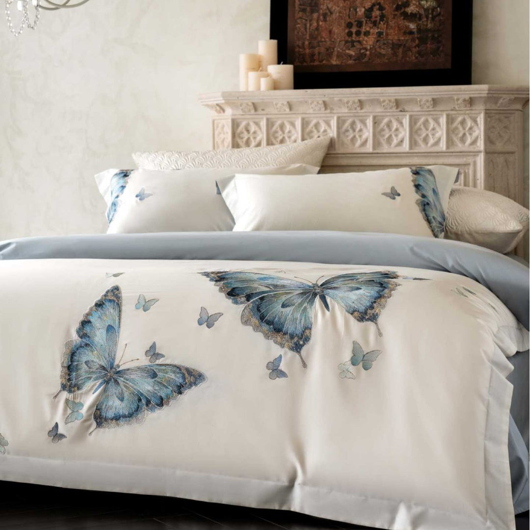 Embroidered cotton satin bedding set with blue butterfly motif