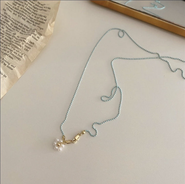Eyewear chain with pearls and gold pendants Kalsten
