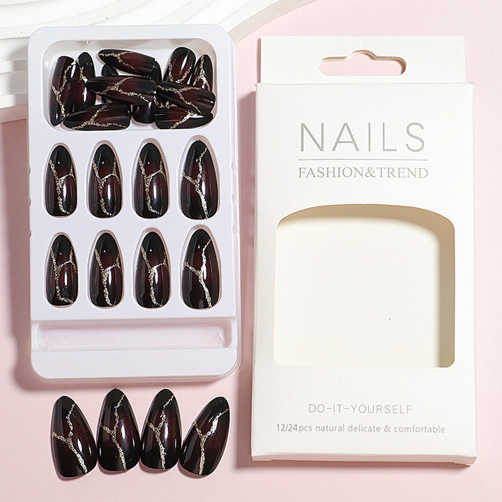 Artistic Press-On Nail Design with Gold Veining Accents Kalsten