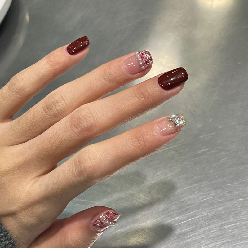Elegant Press-On Nail Design with Glitter and Gemstone Accents Kalsten