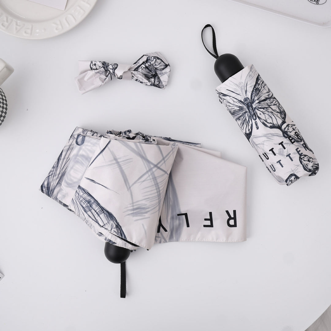 Women's fashionable folding umbrella with playful design Kalsten