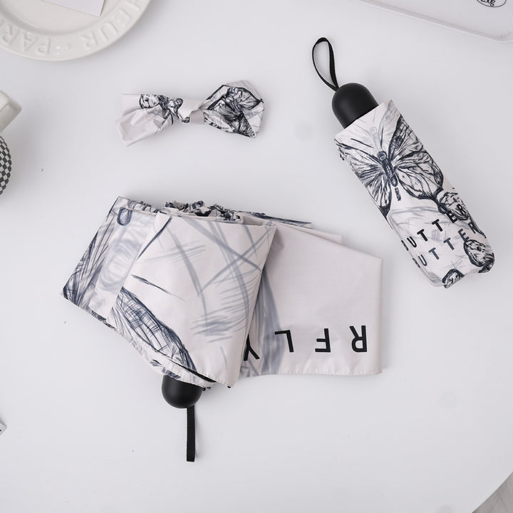 Women's fashionable folding umbrella with playful design Kalsten