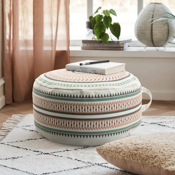 Round padded floor seat pouf with woven ethnic pattern and carrying handle Kalsten