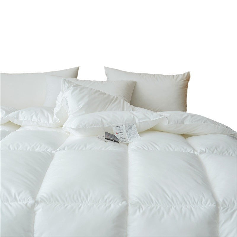 Lightweight all-season duvet with hypoallergenic hollow fiber filling and box chamber quilting