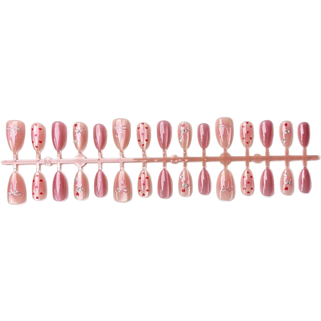 Nail art set with romantic hearts and elegant bows Kalsten