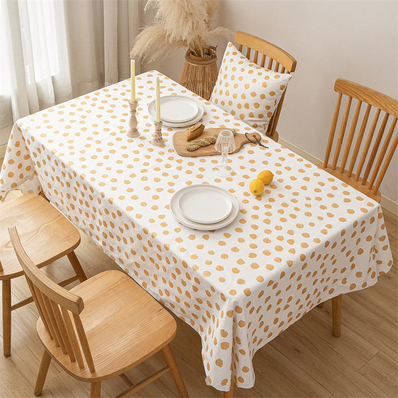 Rectangular tablecloth made of cotton blend fabric with gold dot print