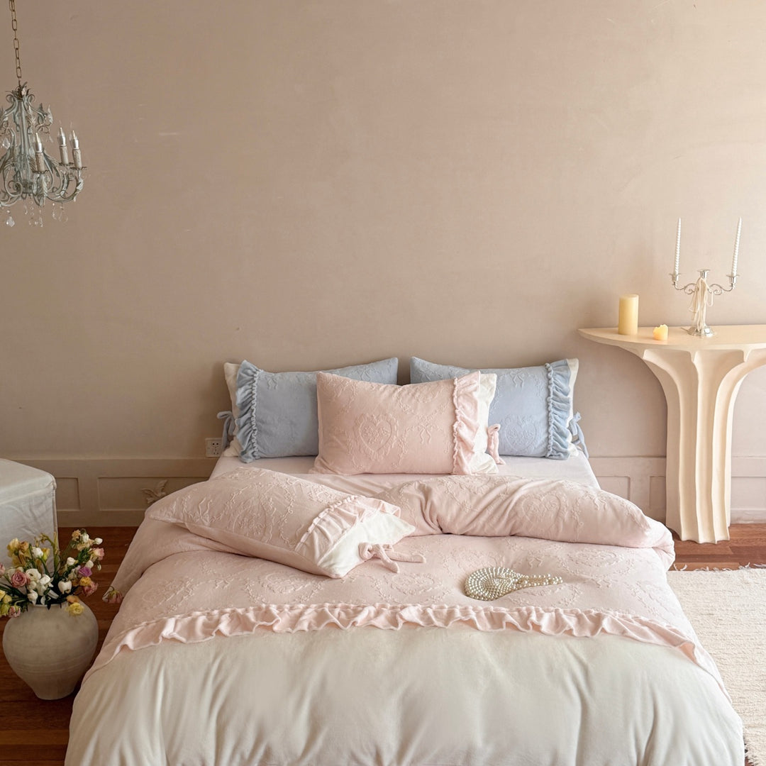 Romantic cotton satin bedding set with ruffled hem and fine tone-on-tone embroidery