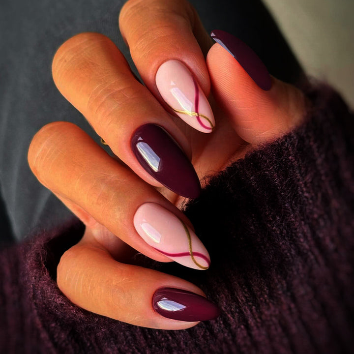 Artistic Almond-Shaped Press-On Nails with Elegant Gold Detailing Kalsten