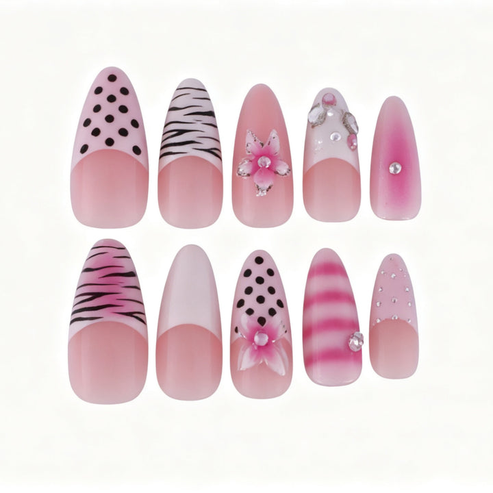 Artistic Press-On Nail Design with Unique Patterns and Rhinestone Accents Kalsten