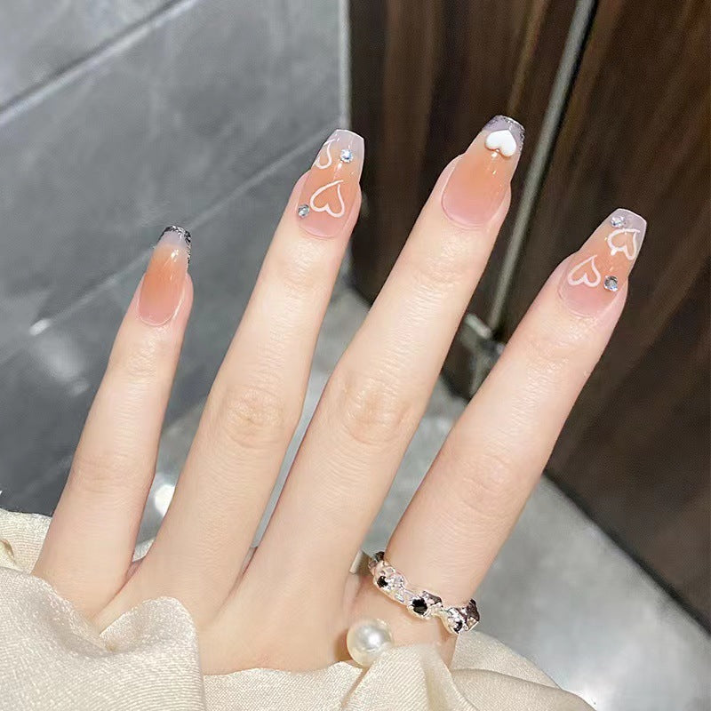 Artful nail tips in heart design Kalsten