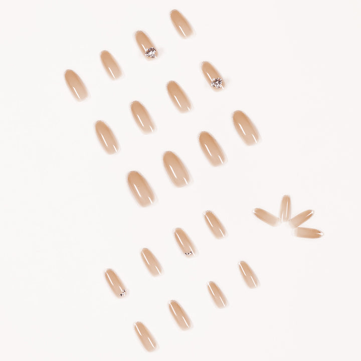 Artful Nail Art with Rhinestone Embellishments Kalsten