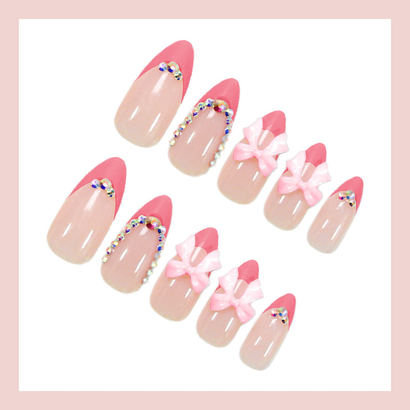 Artificial nail set with playful floral decorations and elegant glitter accents Kalsten
