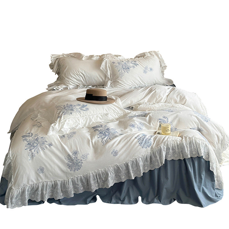 Embroidered bedding set in country house style with ruffled edging and eyelet lace