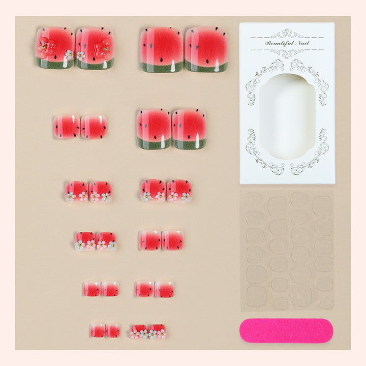 Nail set with watermelon design and floral accents Kalsten