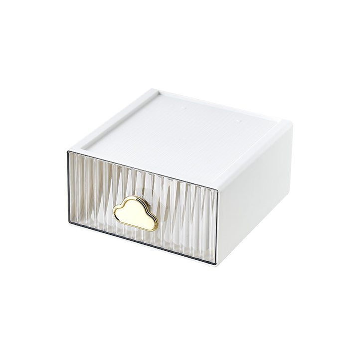 Small jewelry storage box with ribbed front and decorative cloud handle