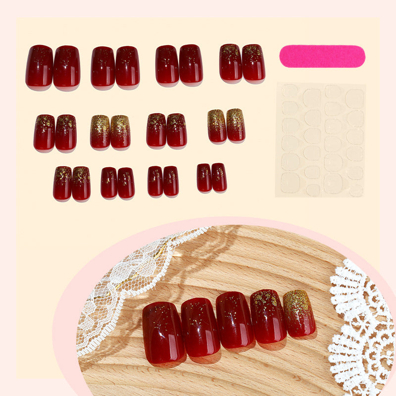 Elegant Press-On Nail Set with Glamorous Gold Glitter Accents Kalsten
