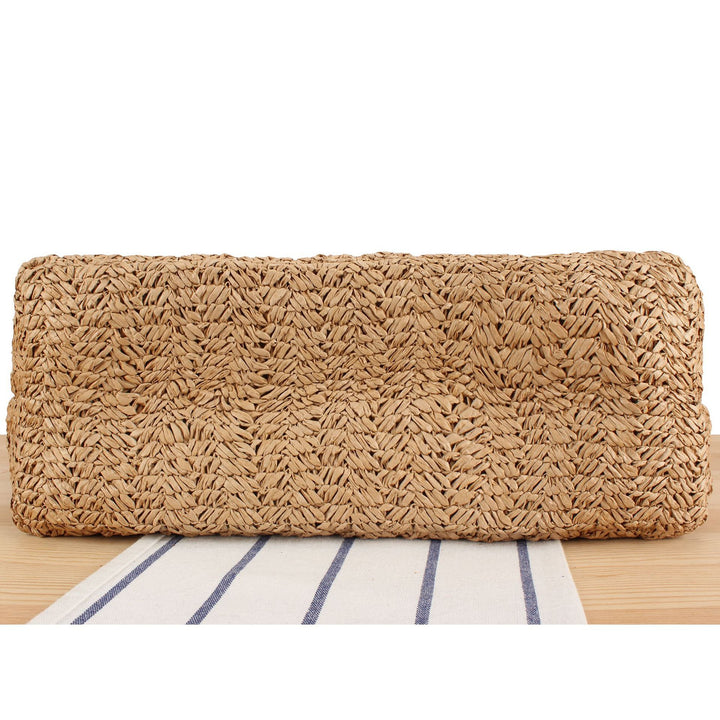 Beach bag made of natural woven material with sturdy carry handles Kalsten