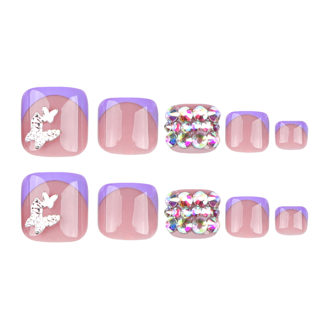 Artful toenail art with elegant glitter decorations Kalsten