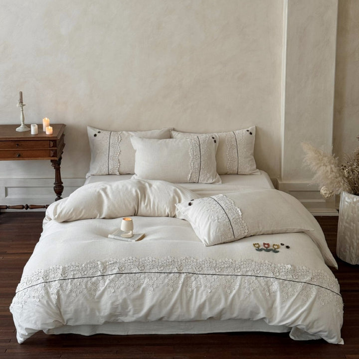 Bedding set in linen look with embroidered lace border and fine embroidery