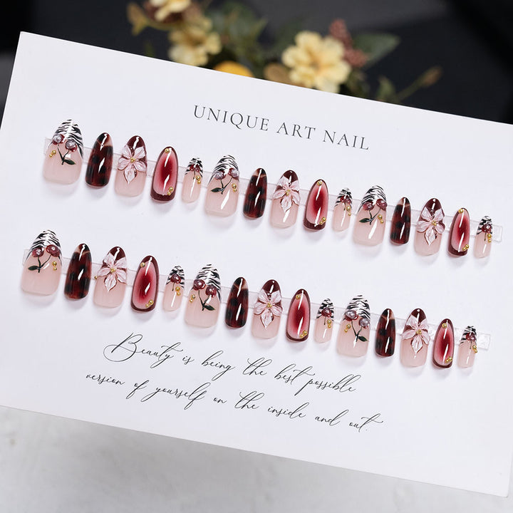 Artistic Stiletto Press-On Nails with Floral and Abstract Designs