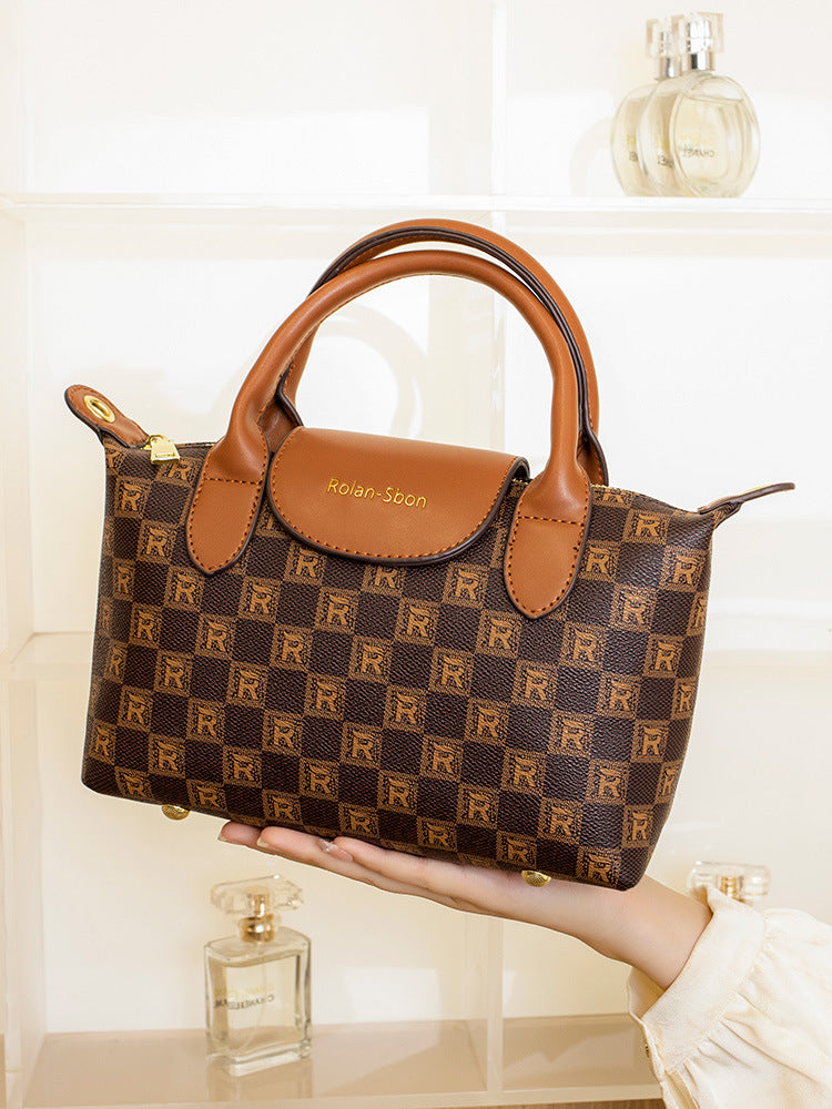 Elegant Designer Handbag with Structured Design