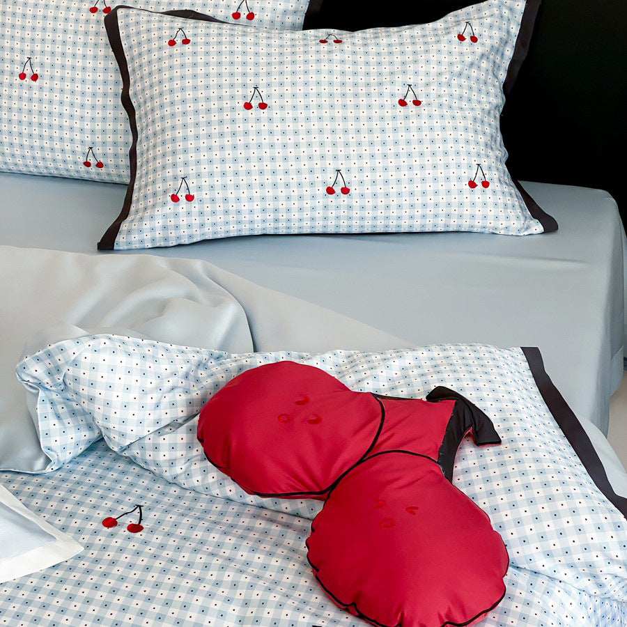 Playful cotton satin bedding set with cherry print and fine check pattern