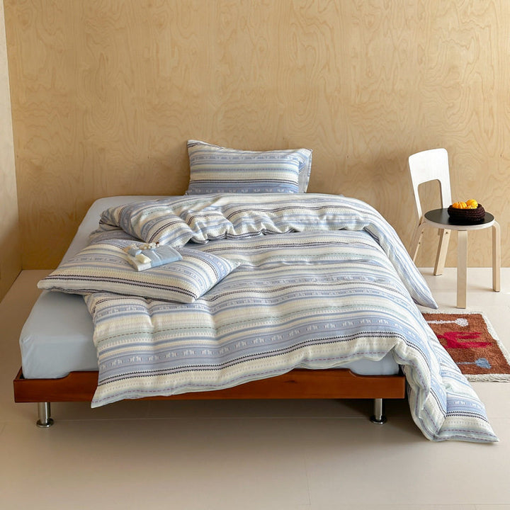 Premium bedding set in nordic-inspired striped pattern made of cotton percale