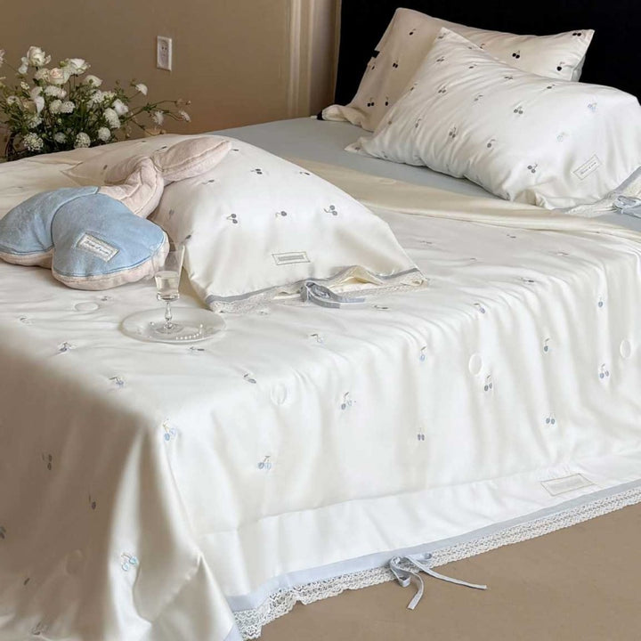Luxurious cotton satin bedding set with cherry print, lace trim and frill