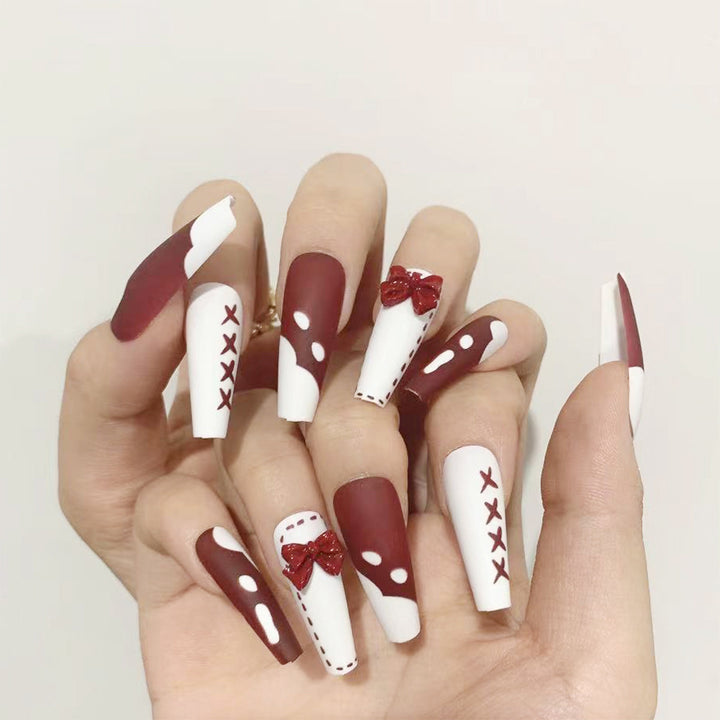 Artful stiletto nails with decoration and glitter Kalsten