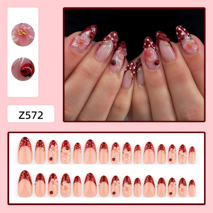 Artificial nails with floral design and 3D accents Kalsten