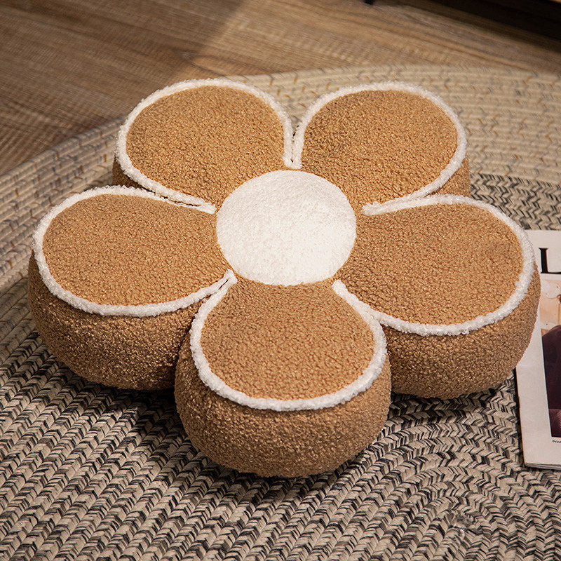 Padded seat cushion in flower shape with faux leather center piece and fluffy edge padding