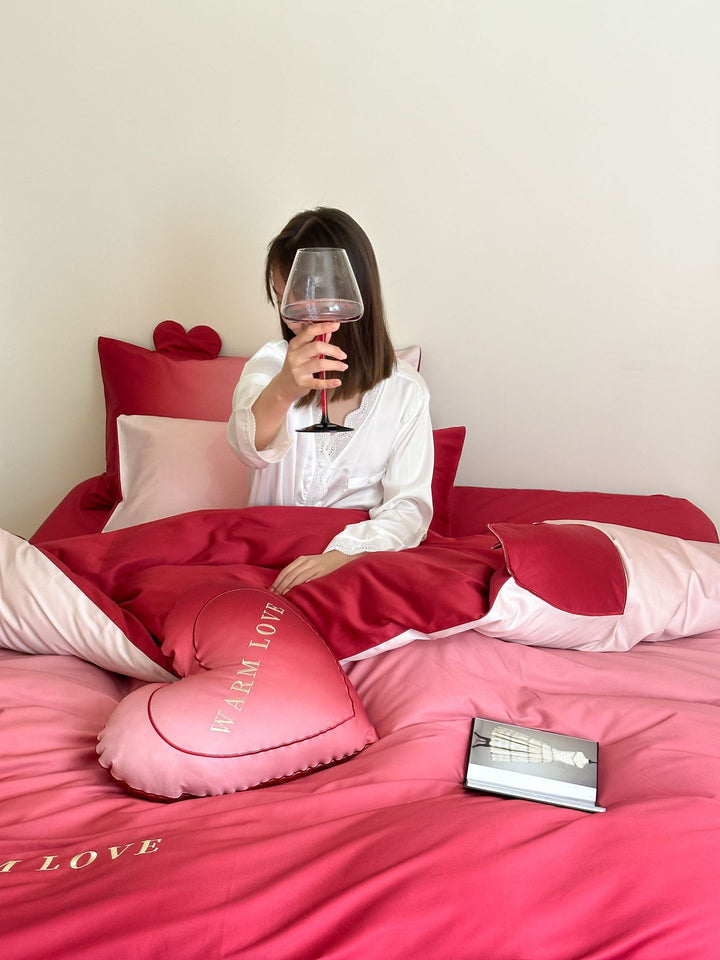 Luxurious satin bedding set with heart pillow and reversible function